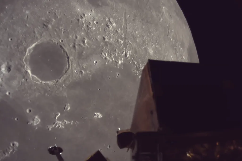 a spacecraft above the moon's surface
