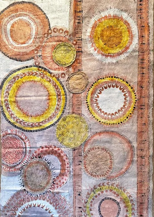 Paint bark cloth artwork with overlapping circles in pink, yellow, and orange.