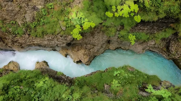 River meandering through rocky Alps thumbnail