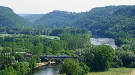 The Dordogne River flows through some of the finest country of southern France. Truffles, cep mushrooms and wild pigs occur in the woods, while huge catfish and pike lurk in the slow eddies of the river.