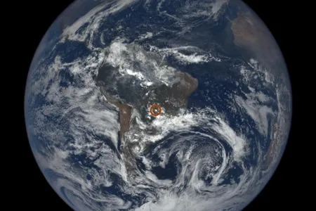 DISCOVR captured a glint over South America. Scientists now think that horizontal ice crystals in the troposphere account for the phenomenon, which can be viewed from deep space. 