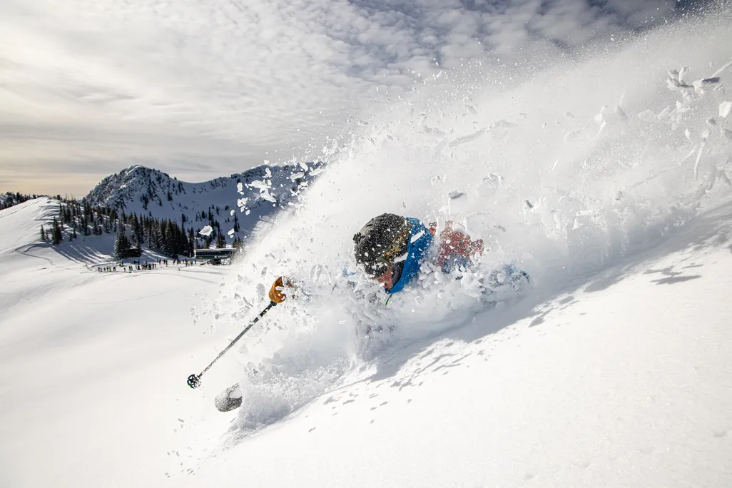 Skier shredding powder in utah