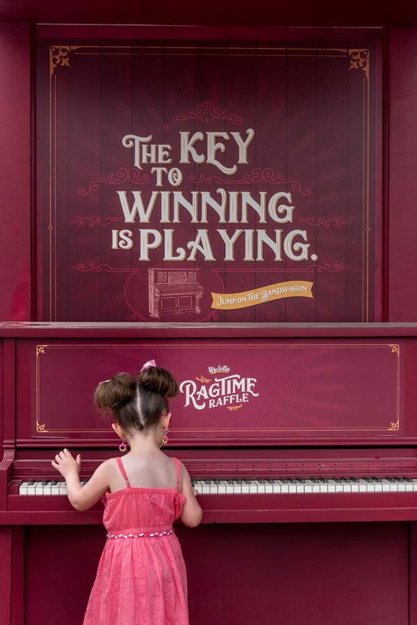 Girl plays the piano at Cheyenne, Wyoming's Frontier Days festival thumbnail