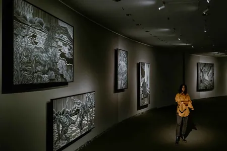 Toyin Ojih Odutola (above) &ldquo;flips the script in every aspect," she says of her 40 charcoal and pastel drawings depicting a story about a strong race of women, called the&nbsp;Eshu,&nbsp;who rule over humanoid men made to work in the mines or to cultivate food.