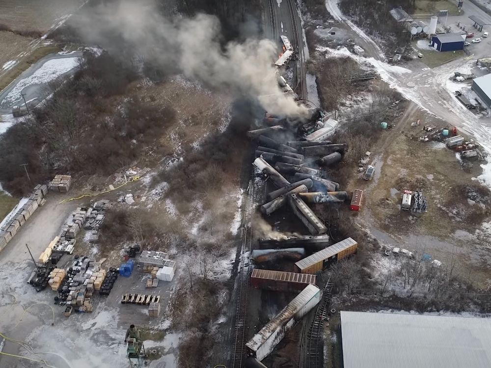 A video screenshot showing the site of the derailed train