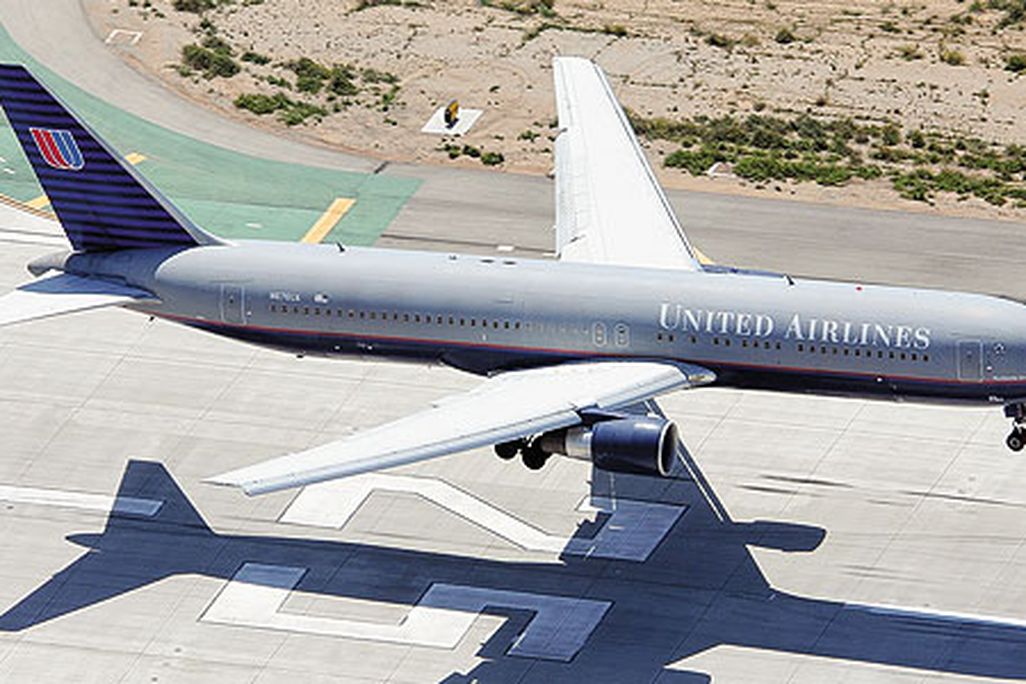 A Boeing 767-300 lands on Los Angeles International Airport’s runway 25L.