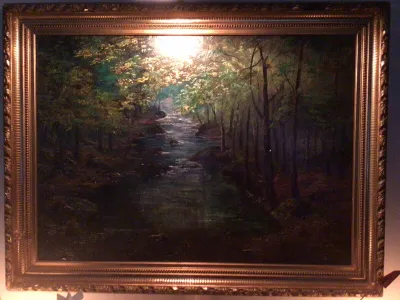 An image from the eBay listing for&nbsp;Forest With a Stream, which is attributed to&nbsp;Claude Monet