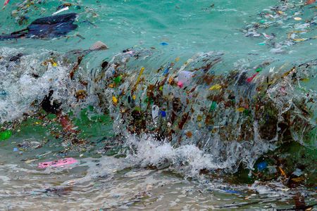 A wave carrying plastic washes up in Thailand.&nbsp;For microbes in the ocean, floating plastic is a new potential ecosystem. And those microbes include pathogens that can make people sick.&nbsp;