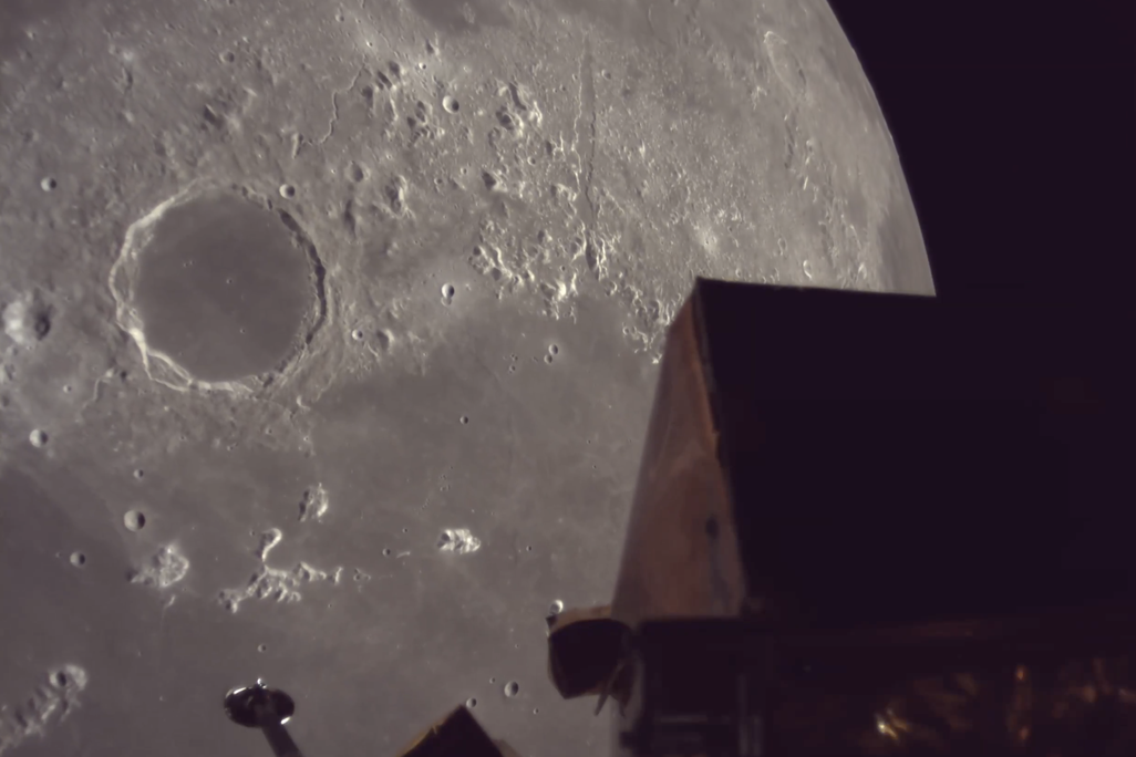 a spacecraft above the moon's surface