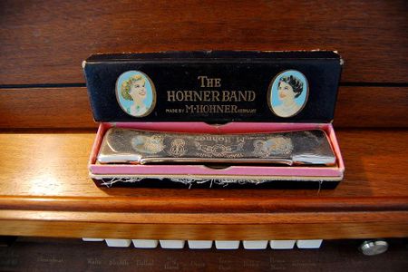 A standard 10-hole Hohner harmonica.
