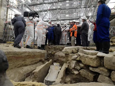 French culture minister officials visits the site of the discovery where an ancient human-shaped sarcophogus was found, among other objects, including sculptures, carvings and a 13th-century altar screen.&nbsp;