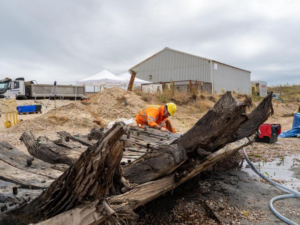 Archaeologist studies remains of ship