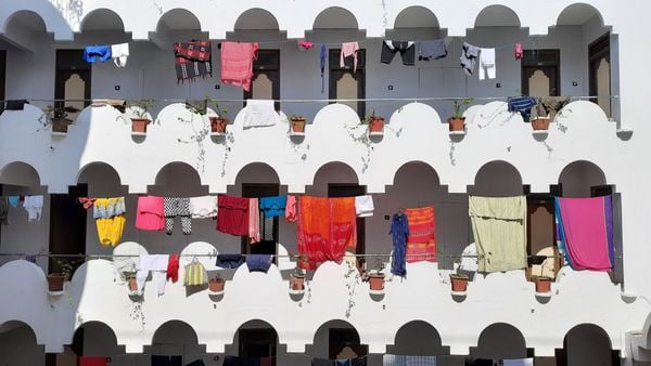 tourists hung clothes to dry in a hotel thumbnail