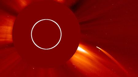 The C/2011 N3 comet is caught on a coronagraph, an image that blocks out the sun to reveal its corona.
