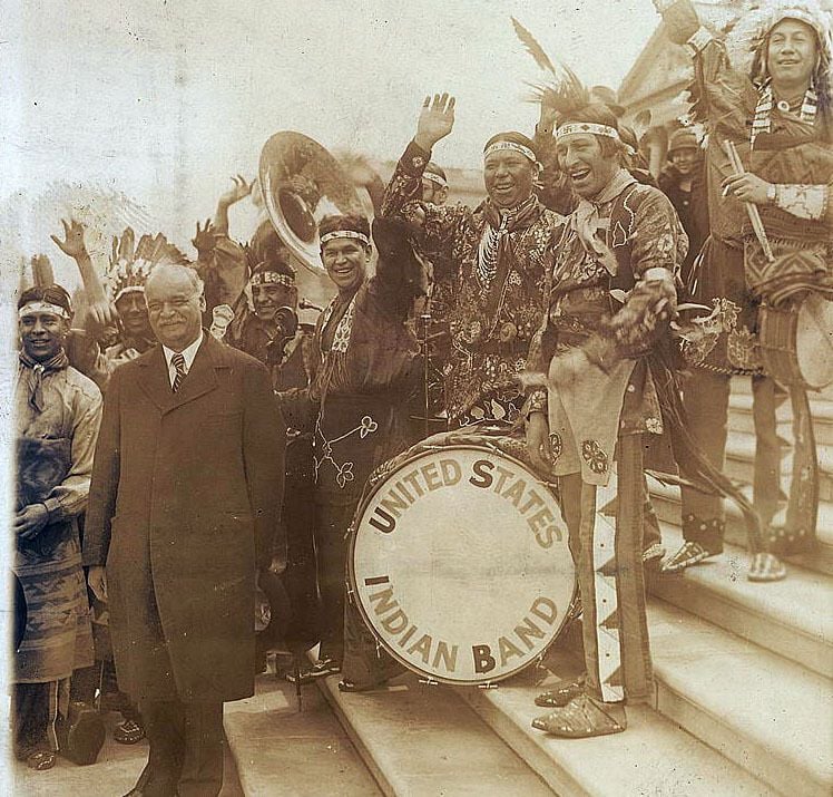 Charles Curtis next to United States Indian Band