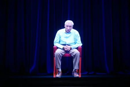 Aaron Elster's hologram answers questions from the audience.
