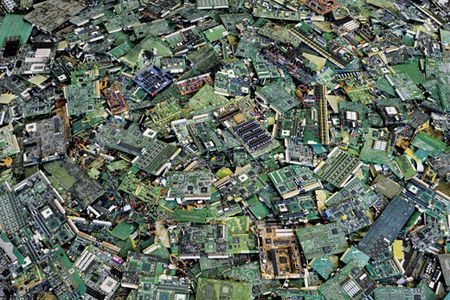 A growing number of U.S. firms dismantle used computers and send valuable parts (Circuit Boards #2, New Orleans, 2005) to companies that glean the semiprecious metals.