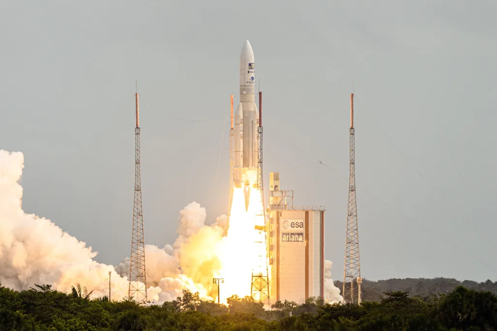A rocket lifting off from Earth