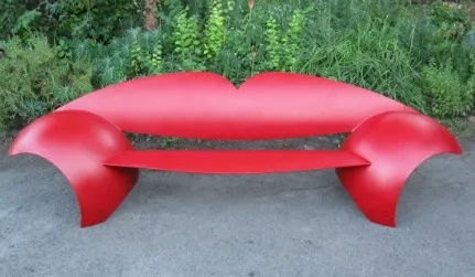 Selig's "Propane Tank Lips Bench" references Dali’s "May West Lips Sofa."