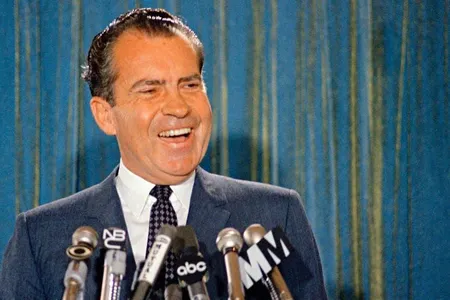 Republican presidential candidate Richard Nixon smiles for the cameras during a 1968 news conference.