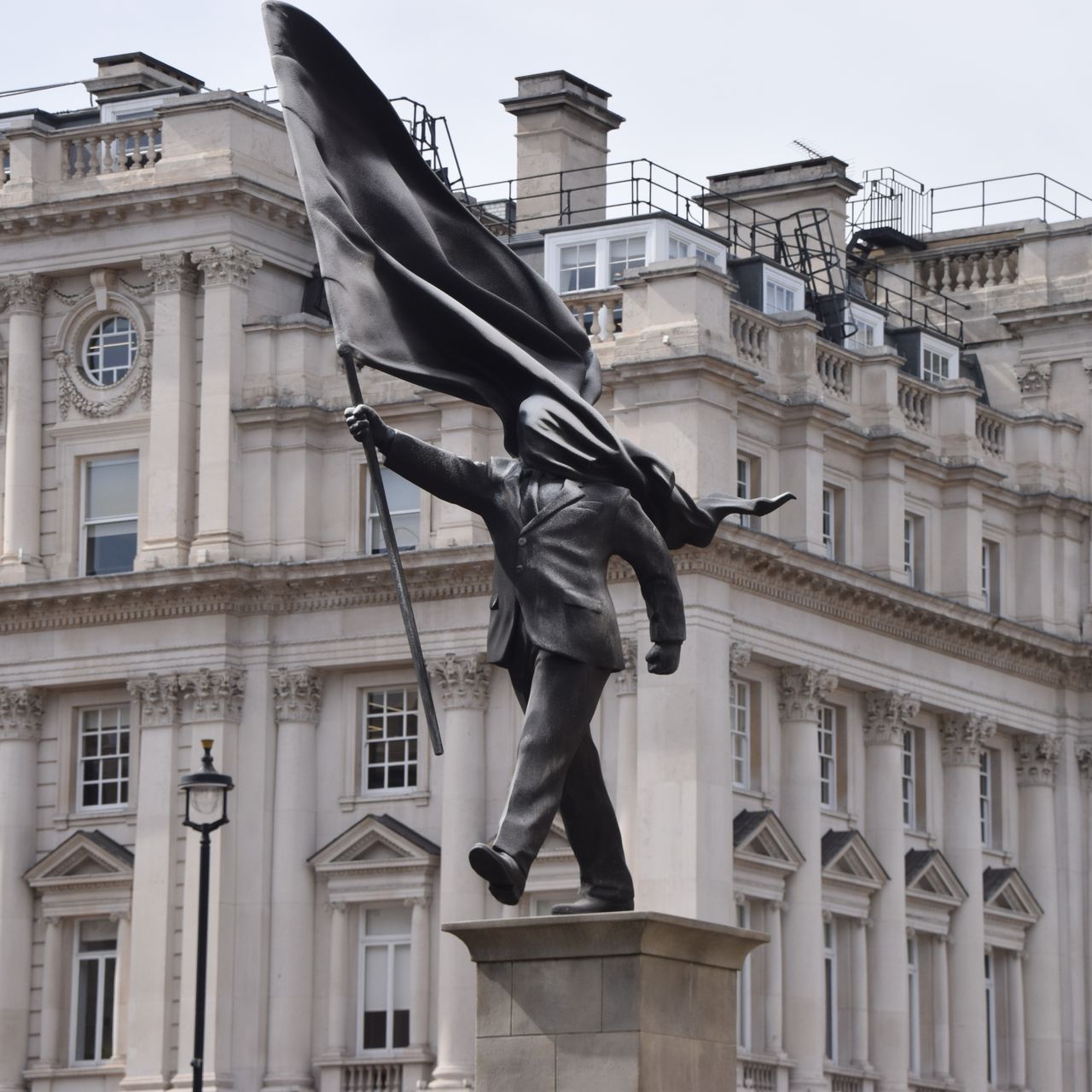 Attributed to Banksy, a New Statue of a Suited Man, Blinded by a