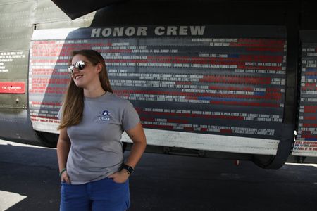 “Loving old airplanes, I tend to go up to people and ask them if I can help with theirs,” says Rohaise Firth-Butterfield, standing beneath the wing of the Collings Foundation B-24 during its visit to the San Antonio airport.
