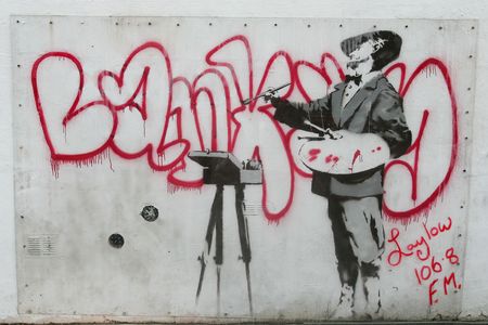The secretive street artist Banksy painted this graffiti mural in London in 2008.