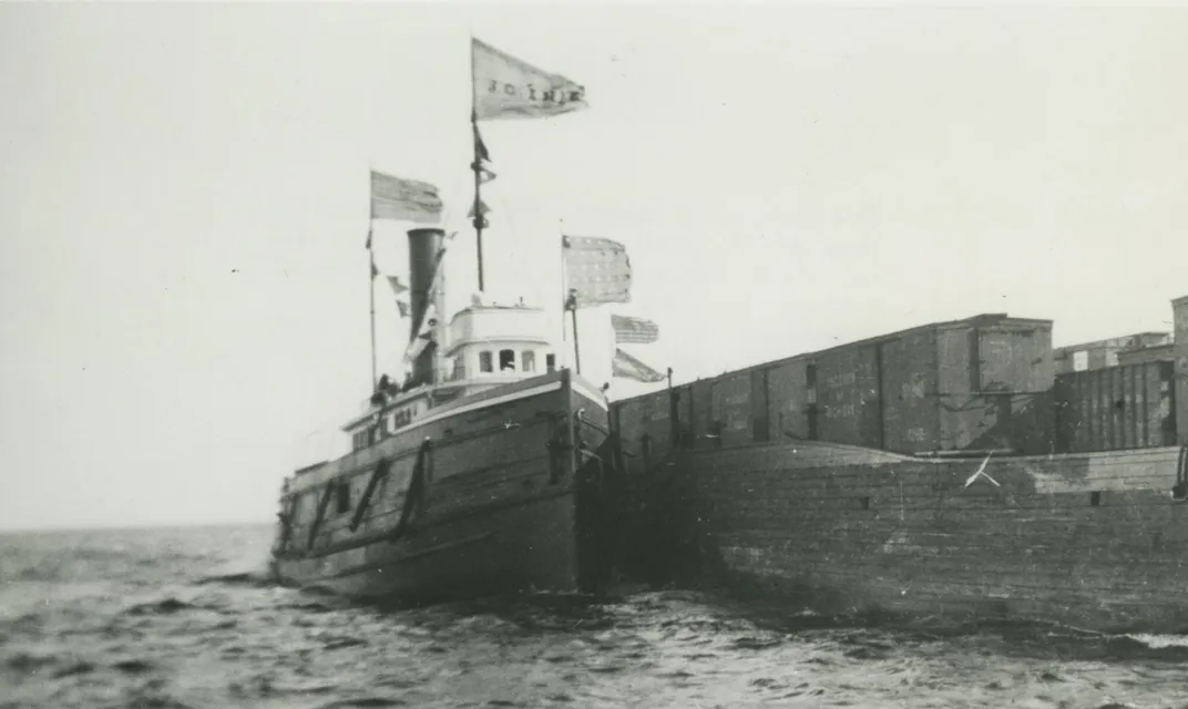 Black and white photo of tugboat