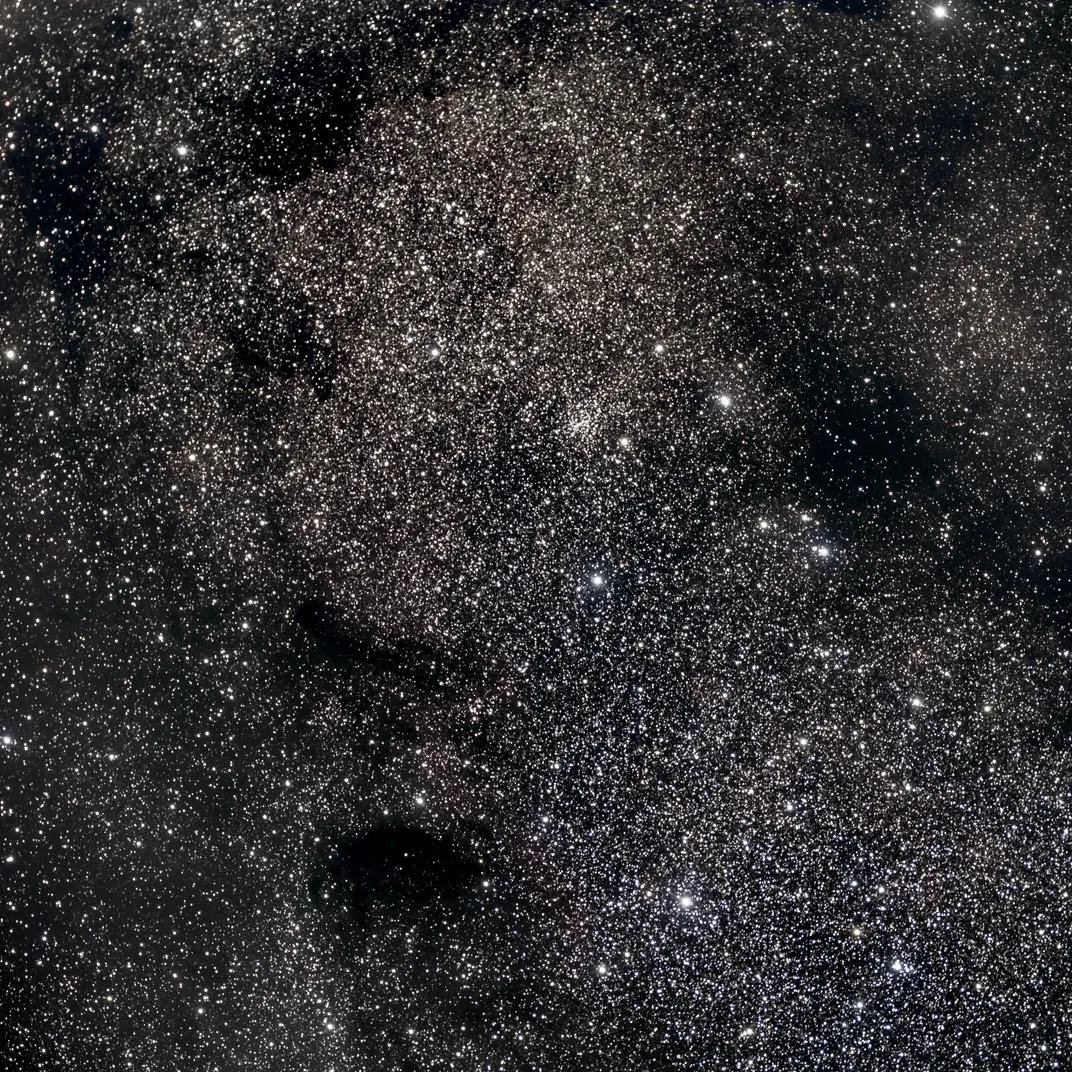 a dense collection of stars and cosmic dust