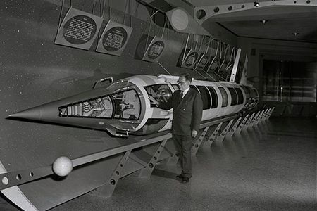 Willy Ley with a Viking sounding rocket on display at the American Museum of Natural History in New York, 1956.