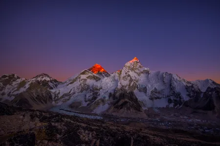 Mount Everest seen at sunset, as the peak&rsquo;s height continues to grow at a rate of about two millimeters per year.