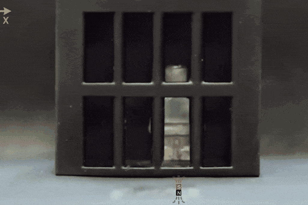 person-shaped robot melts out of cage and re-forms