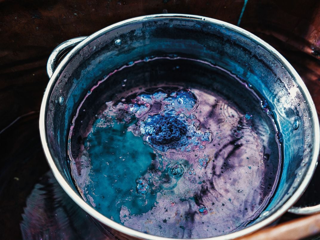 A bucket of indigo dye