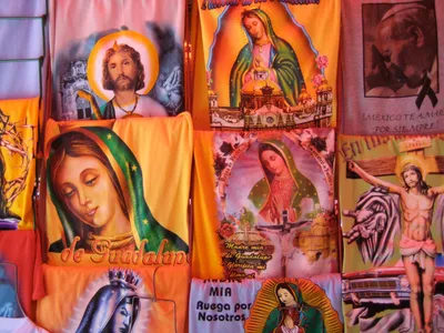 Most of the T-shirts had in common the image that appeared on Juan Diego’s cloak: the Virgin modestly looking down, her hands folded together in prayer.