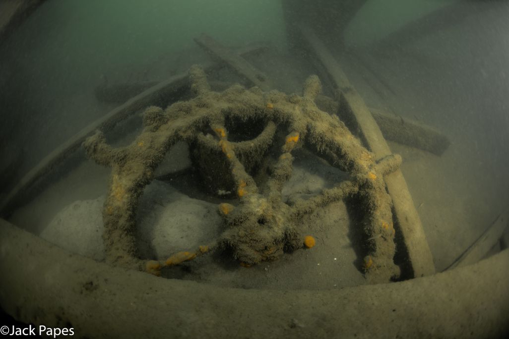 Underwater view of the steering wheel of a ship