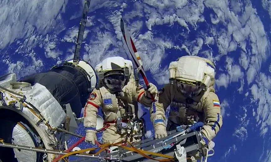 Olympic-torch-Nov 13 spacewalk.jpg