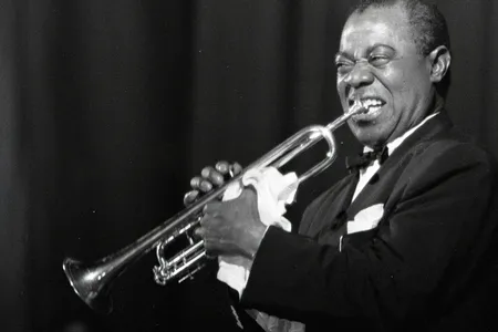 Louis Armstrong playing in Rome in 1959. You can visit his house in Queens, New York, and see how he lived for the last 30 years of his life.