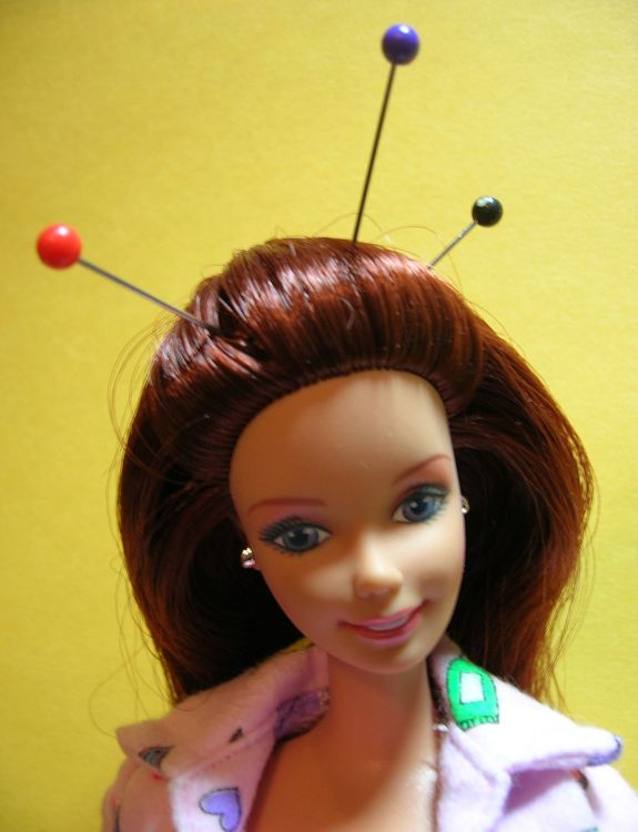 Acupuncture Barbie suffers from chronic pain.