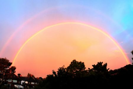 Yellow and red are the primary colors in this double rainbow.