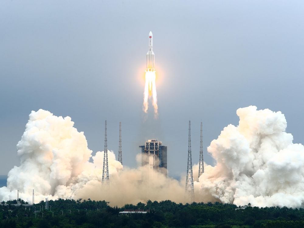 A photo of the first module of the Chinese Space Station blasting off on a rocket to space. 