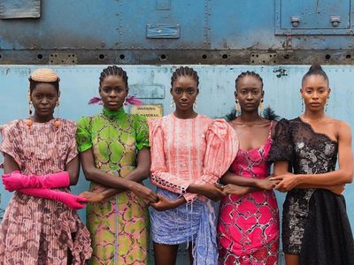 Models holding hands in Lagos, Nigeria, in 2019