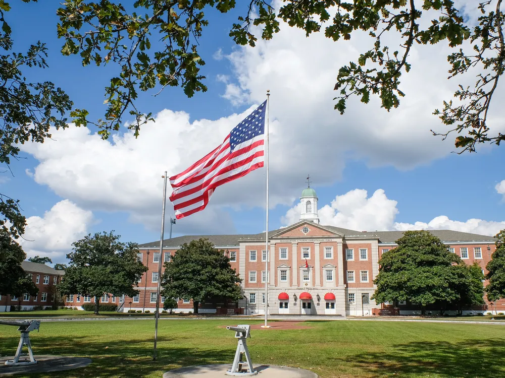 A flag in front of a building at Camp Lejeune