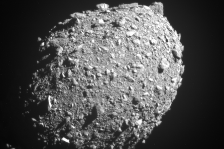 Dimorphos, a moonlet orbiting the asteroid Didymos, as seen by NASA&#39;s DART spacecraft 11 seconds before impact from 42 miles away.