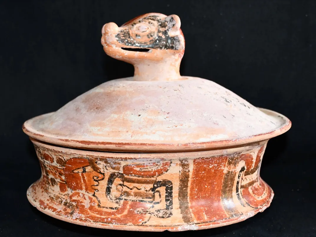 maya_pottery_basal_flange_bowl_with_a_coatimundi_head_as_a_handle_for_the_lid_the_basal_flange.jpeg