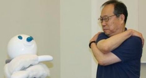 Taizo the robot gets seniors to exercise.