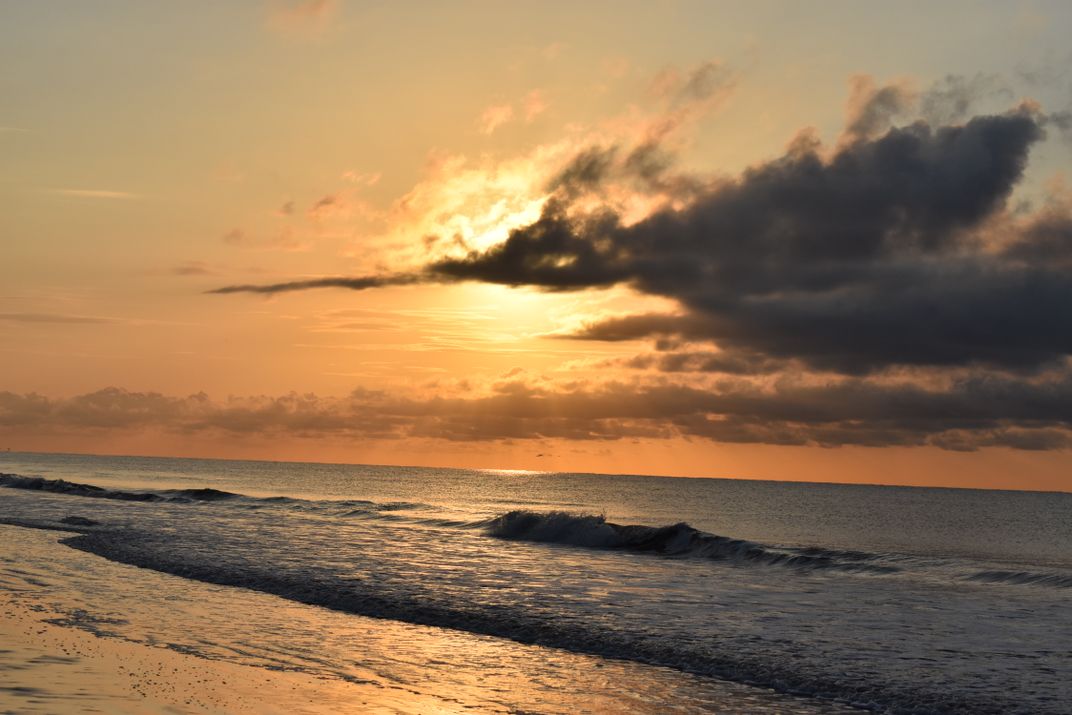 The sunrise while walking on beach in Hilton Head Island, SC