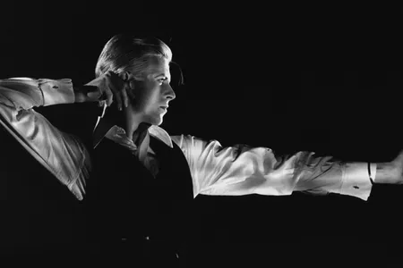 David Bowie performing as the Thin White Duke, one of his personas, during the Station to Station tour in 1976