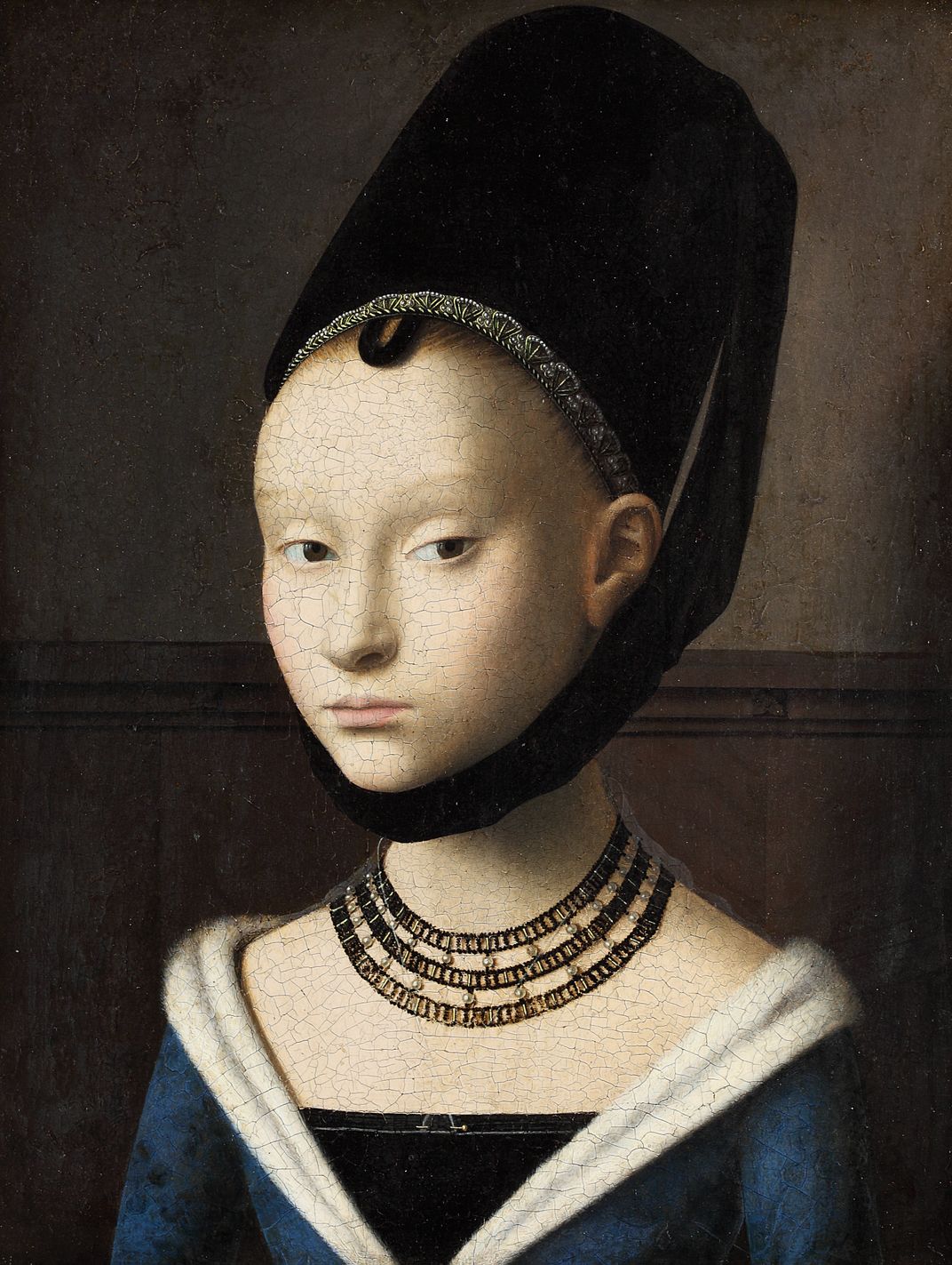 A portrait of a pale young girl with faint eyebrows, a large forehead and wearing dark blue, white and black garments