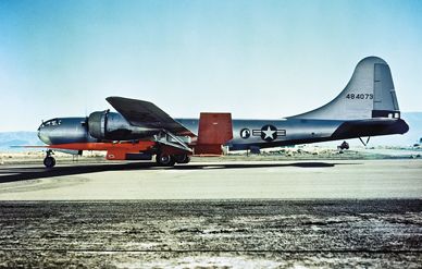The X-7 mounted on its B-29 carrier.
