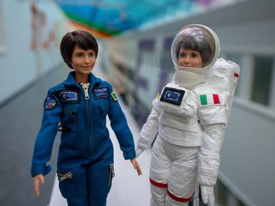 Two Barbie dolls in the likeness of Samantha Cristoforetti, an astronaut and Italian air force pilot who has flown six types of military aircraft.